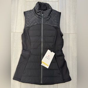Lululemon Down For It All vest. NWT. Black with reflective top. Size 4